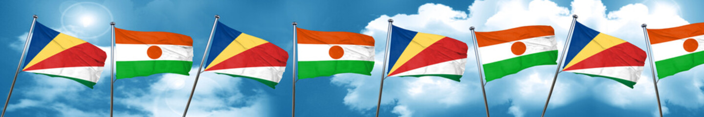 seychelles flag with Niger flag, 3D rendering