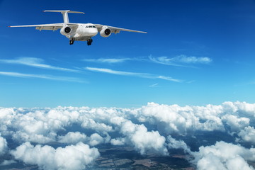 Airplane over the clouds.