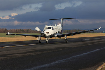 Naklejka premium Single turboprop aircraft, airplane taking off