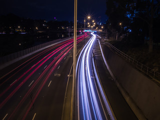 Fototapeta na wymiar Light streaks on highway at night