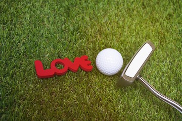 love letter with golf ball and putter
