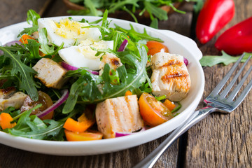 Salad with chicken and fresh vegetables