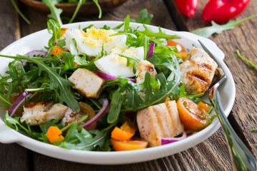 Salad with chicken and fresh vegetables