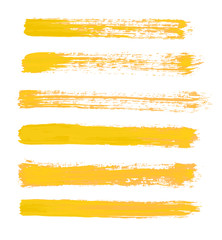 yellow vector strokes of paint on white background
