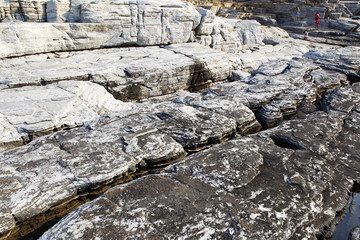 Landscape with water and rocks in Thassos island, Greece, next to the natural pool called Giola Beautiful textures and details