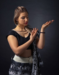 Dancing  woman in the national Indian costume