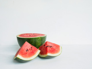 Fresh watermelon cutting on white desk