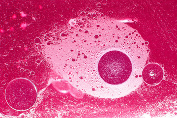 Oil and water abstract/  Oil and water are two liquids that will not mix together