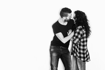 Gorgeous couple portrait laughing and smiling together black and white