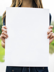 Woman Holding Blank Paper Concept - obrazy, fototapety, plakaty