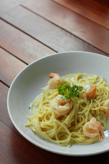 Spaghetti Carbonara or white cream sauce pasta with shrimp.