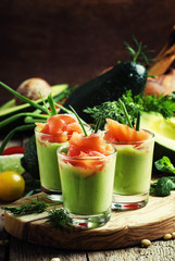 Appetizer with smoked salmon and avocado mousse, served in glass