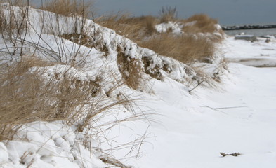 A snow fall covers a private beach in New England, along the Connecticut River and Long Island Sound