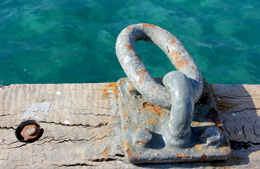 Rurty chain in wooden pier