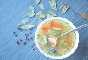 Salmon soup with potatoes, carrots, dill