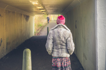 Woman at underpass