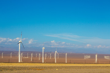 Wind power generators on the curb of high-speed highway not far from Kashgar in the Xinjiang Uyghur Autonomous Region, in China’s far west 