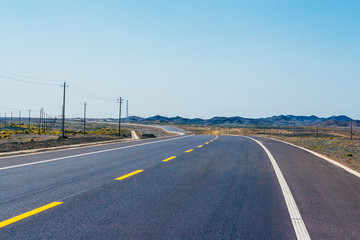 Fototapeta premium Modern high-speed highway not far from Kashgar in the Xinjiang Uyghur Autonomous Region, in China’s far west 