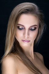 Fototapeta premium Fashionable and beautiful girl with long hair. Perfect make-up