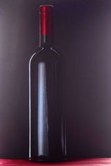 bottle of wine and glass on the table