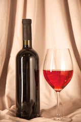 bottle of wine and glass on the table