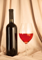 bottle of wine and glass on the table