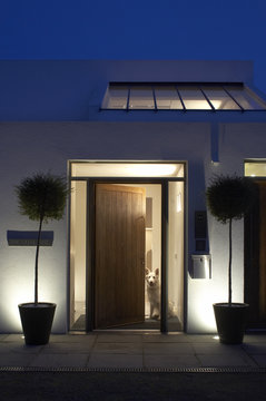 House in Kent, Entrance at dusk, with dog