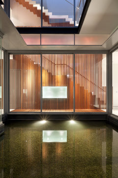 Lit internal water feature in residential house 
