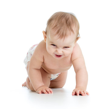 Funny baby weared nappy crawling on floor. Isolated on white background.