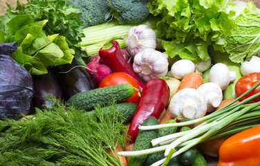 Background of fresh vegetables and greens closeup 