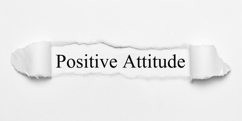 Obraz premium Positive Attitude on white torn paper