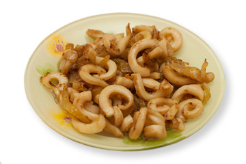 Fried squid with onions isolated on white background