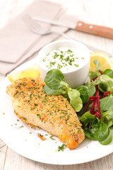 chicken breast with crumbs and sauce