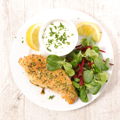 chicken breast with crumbs and sauce