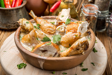 Oven-roasted orange chicken with red onion.  honey  legs