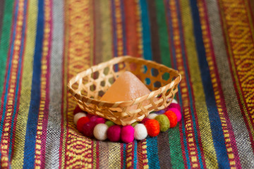 colorful handmade fabric and colorful wool .
