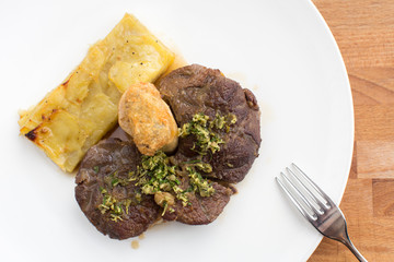 Rack of Lamb with peas and potatoes