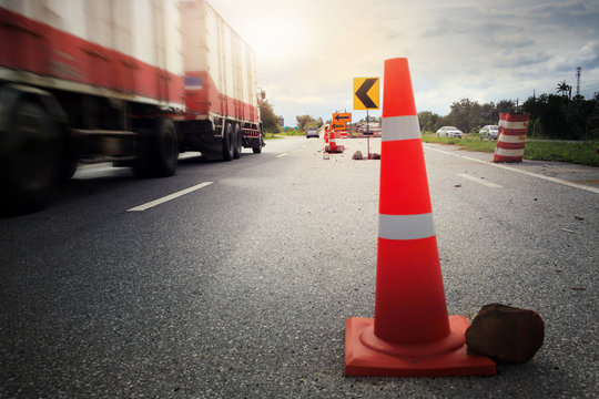 Traffic cones and " Diversion" sign outside a construction zone.