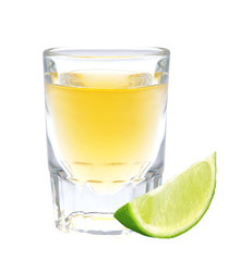 Glass of vodka with pepper and lime slice isolated on white