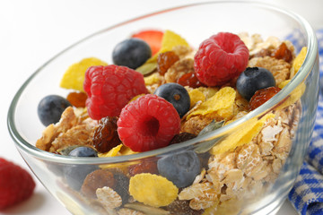 bowl of breakfast cereals and fresh berry fruit
