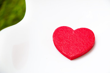 red heart shape on white background