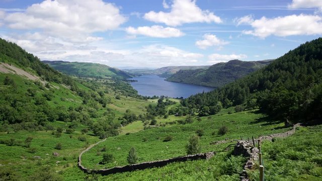 Views of Ullswater Lake on a sunny summers day from Glencoyne in the English Lake District, UK.