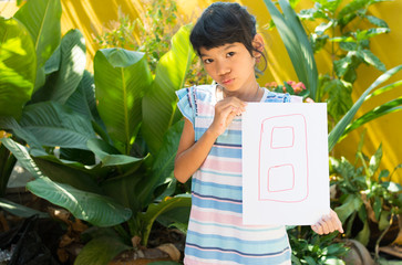 number concept,girl holding number eight on white paper