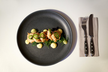 close up of prawn salad with jalapeno and wakame
