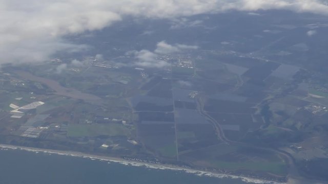 Aerial view of Oxnard farm land with cloudscape, California