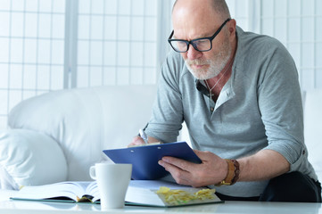 mature businessman  at home