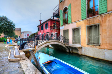 Fototapeta na wymiar Traditional bridge architecture over canal in Venice, Italy