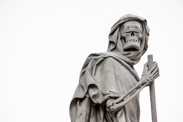 The Grim Reaper Death personified statue, holding sickle