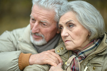 Thoughtful senior couple