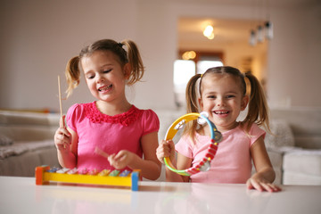 Two little girl at music school.